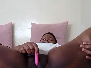 Shaved pussy black beauty pleasures herself with vibrator to reach orgasm