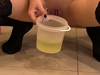 Russian blonde indulges in fetish outfit and fingering after golden shower