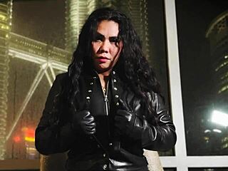 Experience the thrill of leather and glove fetish with an Asian dominatrix