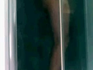 Soloboy enjoys a solo shower with exhibitionist twist